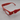 Red readers with a "twist": ALTACHÉ Gold Knot Eyewear Charm